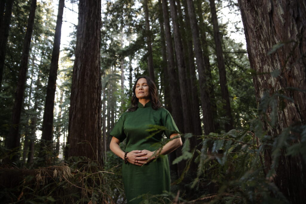 Dr LeTa doing Qi Gong in the redwoods